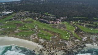 DFKSF16_016 - 5K aerial stock footage flyby a coastal hotel and resort with golf course in Pebble Beach, California
