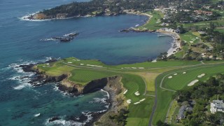 DFKSF16_036 - 5K aerial stock footage of a waterfront golf course by Carmel Bay, Pebble Beach, California