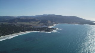 DFKSF16_038 - 5K aerial stock footage of flying over Carmel Bay, pan over beaches, beachfront homes, Carmel, California