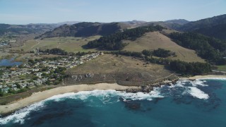 DFKSF16_039 - 5K aerial stock footage tilt from Carmel Bay revealing Carmel State Beach and homes, Carmel, California