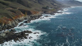DFKSF16_058 - 5K aerial stock footage tilt down to ocean, then up to reveal coastline, Carmel, California