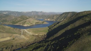 DFKSF17_001 - 5K aerial stock footage of flying by Lopez Lake and Lopez Dam, San Luis Obispo County, California
