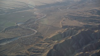DFKSF17_025 - 5K aerial stock footage of flying by a dry riverbed and Caliente Range mountains, Cuyama Valley, California