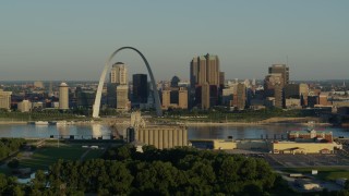 DX0001_000517 - 5.7K aerial stock footage of the skyline and Arch across from a park and grain elevator, Downtown St. Louis, Missouri
