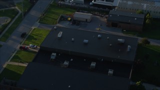 DX0001_000531 - 5.7K aerial stock footage of community college campus, sunrise, East St. Louis, Illinois