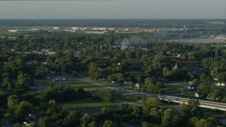 DX0001_000532 - 5.7K aerial stock footage of a residential fire, sunrise, East St. Louis, Illinois