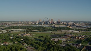 DX0001_000550 - 5.7K aerial stock footage wide angle of skyline and Arch from interstate and park, sunrise, Downtown St. Louis, Missouri