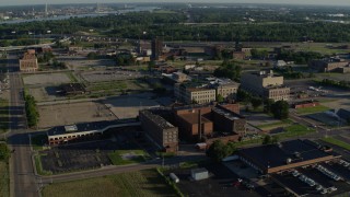 DX0001_000557 - 5.7K stock footage aerial video of government buildings at sunrise, East St Louis, Illinois