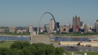 DX0001_000566 - 5.7K aerial stock footage of grain elevator and casino with the Arch and skyline in the background, Downtown St. Louis, Missouri