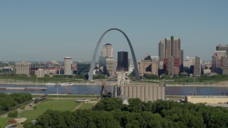 DX0001_000571 - 5.7K aerial stock footage of grain elevator and St. Louis Arch among city skyline, Downtown St. Louis, Missouri