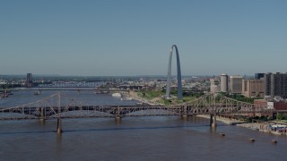 DX0001_000595 - 5.7K aerial stock footage of the Gateway Arch between bridges in Downtown St. Louis, Missouri