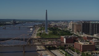 DX0001_000608 - 5.7K aerial stock footage of the Gateway Arch beside the Mississippi River in Downtown St. Louis, Missouri