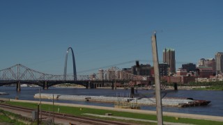 DX0001_000617 - 5.7K aerial stock footage of the Gateway Arch and bridge across the river, Downtown St. Louis, Missouri