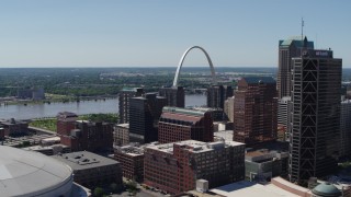 DX0001_000624 - 5.7K aerial stock footage flyby office buildings and skyscrapers near Gateway Arch in Downtown St. Louis, Missouri