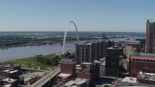DX0001_000626 - 5.7K aerial stock footage of the famous Gateway Arch by the Mississippi River in Downtown St. Louis, Missouri