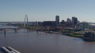 DX0001_000643 - 5.7K aerial stock footage of the Gateway Arch and skyscrapers seen from across the river, Downtown St. Louis, Missouri