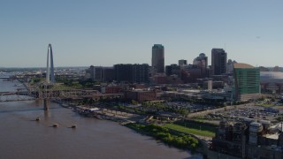 DX0001_000645 - 5.7K aerial stock footage of a reverse view of the Arch and downtown buildings from the river, Downtown St. Louis, Missouri