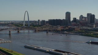 DX0001_000667 - 5.7K aerial stock footage ascend to reveal the Gateway Arch and Downtown St. Louis, Missouri across the river