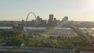 DX0001_000680 - 5.7K aerial stock footage of the Gateway Arch and Downtown St. Louis at sunset, seen from East St. Louis, Illinois