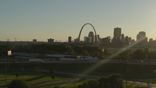 DX0001_000696 - 5.7K aerial stock footage of the Gateway Arch and Downtown St. Louis, Missouri skyline at sunset