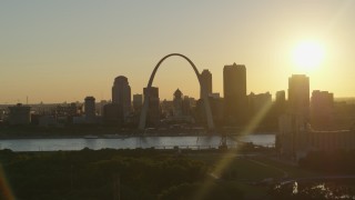 DX0001_000701 - 5.7K aerial stock footage the Arch and Downtown St. Louis, Missouri skyline with setting sun in background