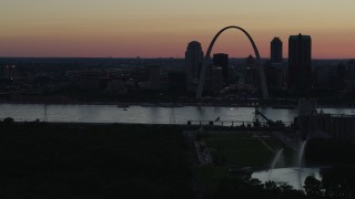 DX0001_000747 - 5.7K aerial stock footage of the city skyline in silhouette, Downtown St. Louis, Missouri, twilight