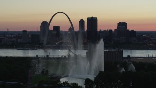 DX0001_000749 - 5.7K aerial stock footage of the Gateway Geyser and Arch, Downtown St. Louis, Missouri, twilight