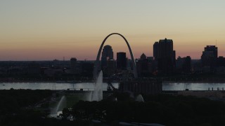 DX0001_000754 - 5.7K aerial stock footage ascend to approach Gateway Geyser, and the Arch in Downtown St. Louis, Missouri, twilight