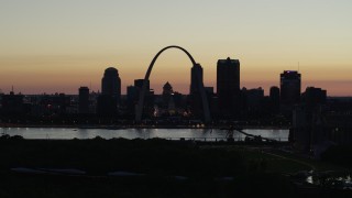 DX0001_000768 - 5.7K aerial stock footage of Downtown St. Louis, Missouri, across the Mississippi River at twilight