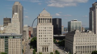 DX0001_000775 - 5.7K aerial stock footage of passing by courthouses to reveal the Gateway Arch in Downtown St. Louis, Missouri