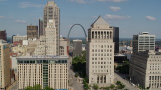 DX0001_000781 - 5.7K aerial stock footage reverse view of courthouses and the Gateway Arch in Downtown St. Louis, Missouri