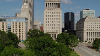 DX0001_000786 - 5.7K stock footage aerial video ascend by courthouse and reveal Gateway Arch in Downtown St. Louis, Missouri