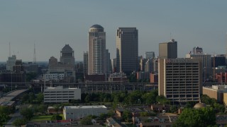 DX0001_000821 - 5.7K aerial stock footage of tall skyscrapers and reveal an office building in Downtown St. Louis, Missouri