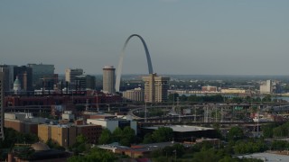 DX0001_000827 - 5.7K aerial stock footage of the Gateway Arch across the city seen while descending in Downtown St. Louis, Missouri