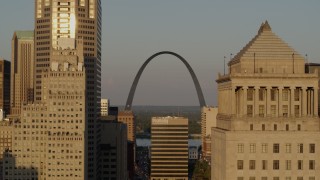 DX0001_000838 - 5.7K aerial stock footage flyby courthouse to reveal Gateway Arch at sunset, Downtown St. Louis, Missouri