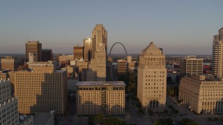 DX0001_000847 - 5.7K aerial stock footage flyby courthouses and reveal the famous Arch at sunset, Downtown St. Louis, Missouri