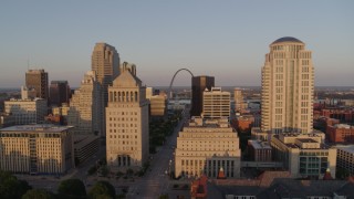 DX0001_000852 - 5.7K aerial stock footage flyby the courthouse buildings to reveal Arch and museum at sunset, Downtown St. Louis, Missouri