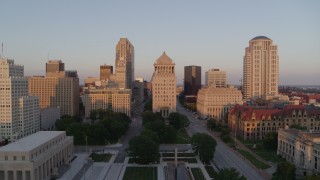 DX0001_000861 - 5.7K aerial stock footage of a reverse view of downtown courthouse buildings at sunset, Downtown St. Louis, Missouri