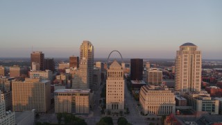 DX0001_000864 - 5.7K aerial stock footage of flying away from the courthouses and downtown at sunset, Downtown St. Louis, Missouri