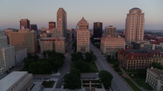 DX0001_000872 - 5.7K aerial stock footage of the Gateway Arch and downtown courthouses at sunset, Downtown St. Louis, Missouri