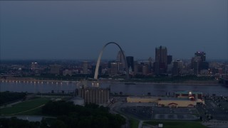 DX0001_000902 - 5.7K aerial stock footage the Gateway Arch at twilight, across the river in Downtown St. Louis, Missouri