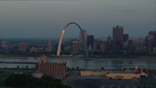 DX0001_000932 - 5.7K aerial stock footage the Gateway Arch reflecting sunlight in Downtown St. Louis, Missouri, at sunrise