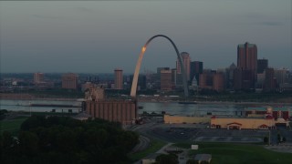DX0001_000933 - 5.7K aerial stock footage the Gateway Arch reflecting morning sunlight in Downtown St. Louis, Missouri