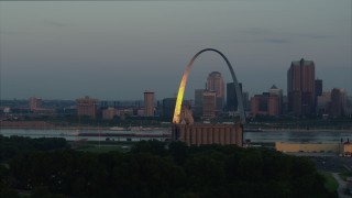 DX0001_000934 - 5.7K aerial stock footage the Gateway Arch reflecting bright morning sunlight in Downtown St. Louis, Missouri