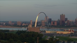 DX0001_000946 - 5.7K aerial stock footage of the St. Louis Arch while descending at sunrise in Downtown St. Louis, Missouri