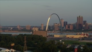 DX0001_000952 - 5.7K aerial stock footage of morning sunlight reflecting off the St. Louis Arch in Downtown St. Louis, Missouri