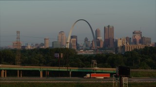 DX0001_000955 - 5.7K aerial stock footage of the Gateway Arch in the morning while descending, reveal I-55, Downtown St. Louis, Missouri