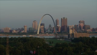 DX0001_000956 - 5.7K aerial stock footage of the Gateway Arch in the morning while ascending from I-55, Downtown St. Louis, Missouri