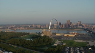 DX0001_000963 - 5.7K aerial stock footage flyby grain elevator with view of the Gateway Arch in the morning, and descend, Downtown St. Louis, Missouri