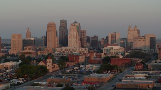 DX0001_000993 - 5.7K aerial stock footage of the city skyline at sunrise, Downtown Kansas City, Missouri
